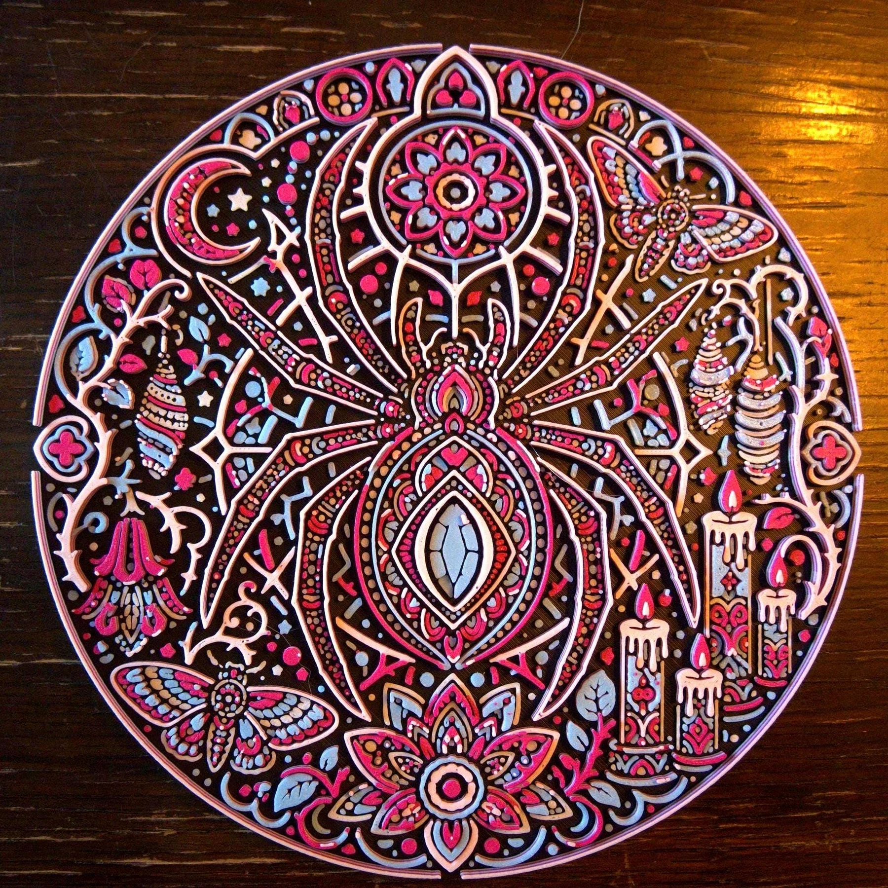 Arachnomancer 3D printed relief wall art in daylight