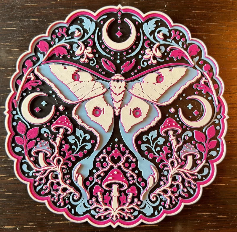 Lunar Moth 3D printed relief wall art in daylight